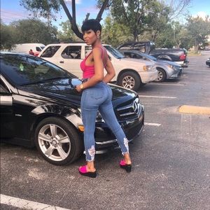 Denim ripped jeans and platform heels